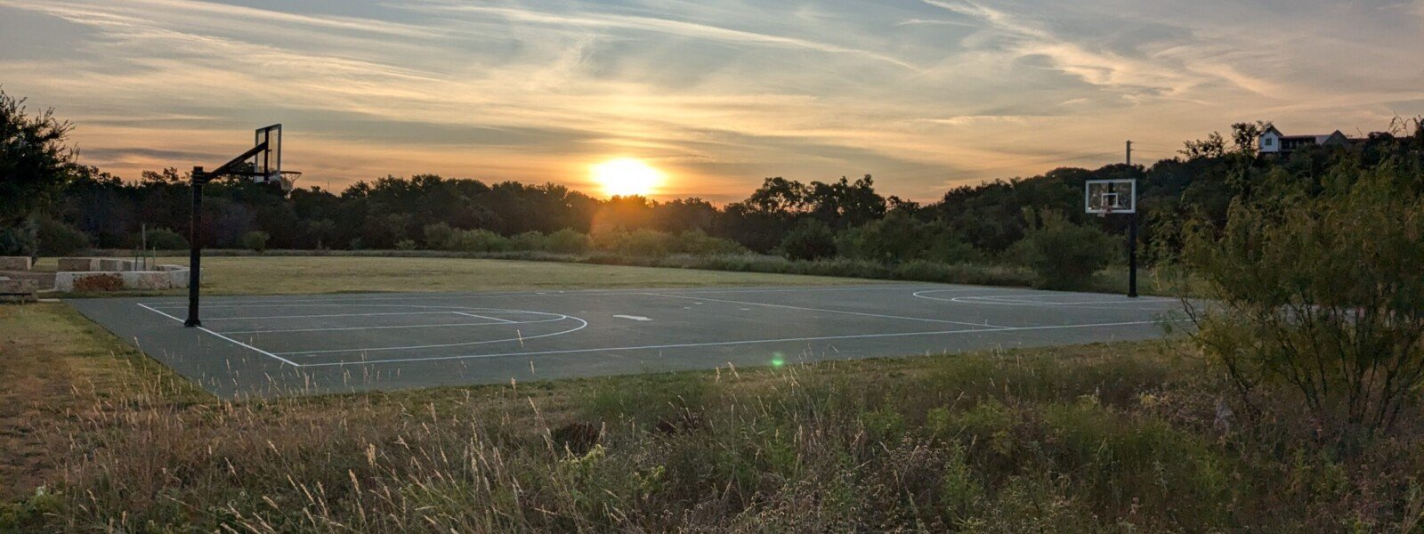 Basketball goal at sunset at South Park